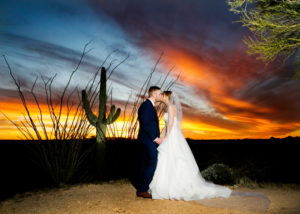 Bride and Groom at Sunset kissing